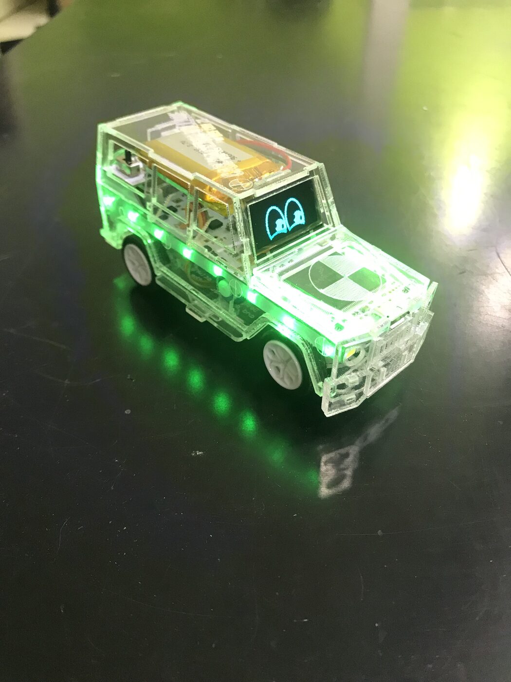 The same badge lit green